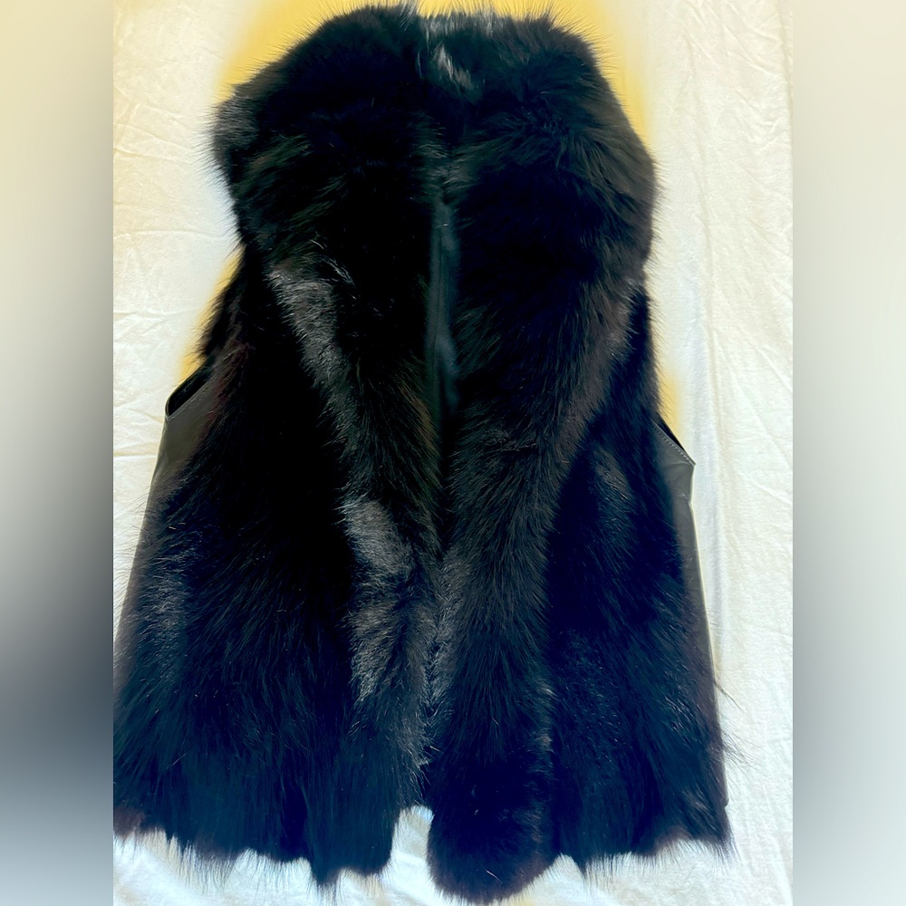 Ultra lux fox fur vest with genuine leather side panelling.